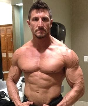 Tommy Gunn is a muscular mature pornstar on PornDig!